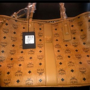 Brand new large sized designer MCM purse